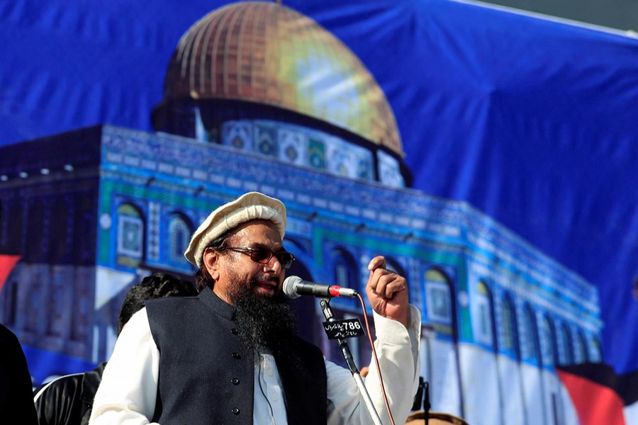 Hafiz Muhammad Saeed, chief of the Islamic charity organisation Jamaat-ud-Dawa (JuD), speaks to supporters during a gathering to protest against Trump's decision to recognise Jerusalem as the capital of Israel, in Rawalpindi, Pakistan on December 29, 2017 — Reuters/Files