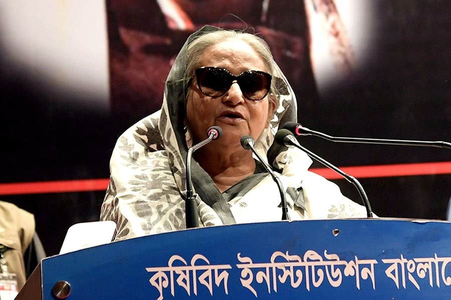 Prime Minister Sheikh Hasina addressing a memorial discussion marking the 15th anniversary of the August 21 grenade attack at Krishibid Institute of Bangladesh (KIB) in Dhaka on Wednesday. Photo: PID