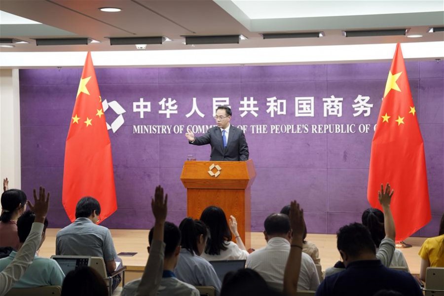 Gao Feng, spokesperson of China's Ministry of Commerce, gestures during the ministry's press conference in Beijing, capital of China, August 22, 2019. Xinhua