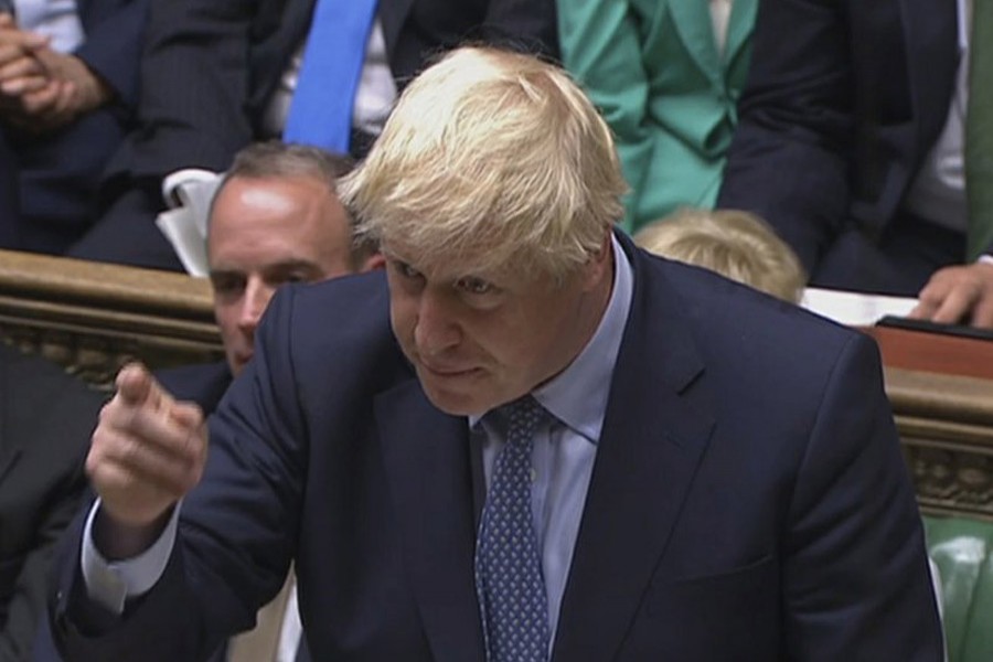 In this handout photo provided by the House of Commons, Britain's Prime Minister Boris Johnson speaks in Parliament in London, Wednesday, September 25, 2019 -- AP
