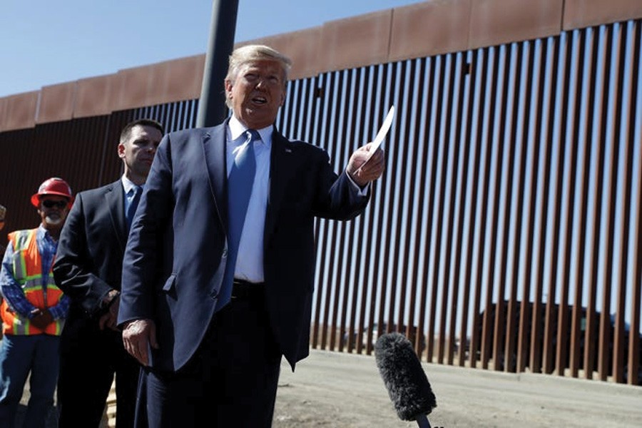 President Donald Trump talks with reporters as he tours a section of the southern border on September 18, 2019, in Otay Messa, California, USA.                 —Photo: AP