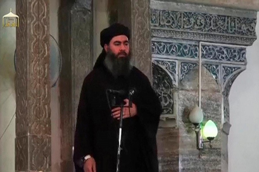 A man purported to be the reclusive leader of the militant Islamic State Abu Bakr al-Baghdadi has made what would be his first public appearance at a mosque in the centre of Iraq's second city, Mosul, according to a video recording posted on the Internet on July 5, 2014, in this still image taken from video — Social Media Website via Reuters TV/Files