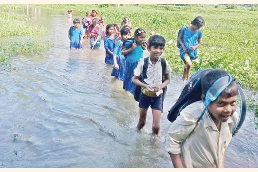 Some students crossing the Bau river to attend the school in Mothurapur union under Dhunot upazila of Bogura district   		— FE Photo
