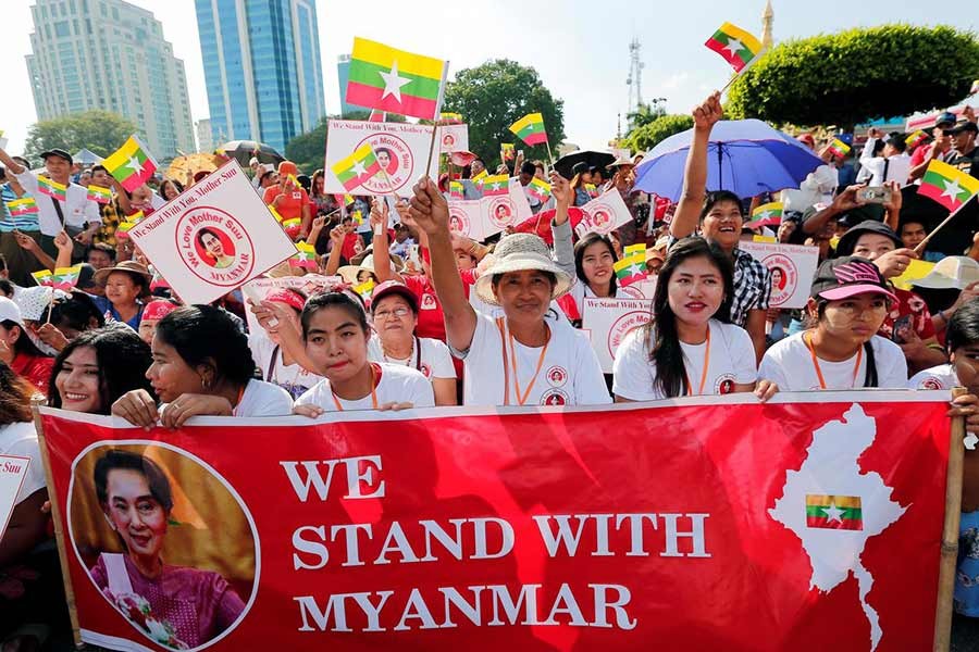 People gathering in a rally in support of Myanmar State Counsellor Aung San Suu Kyi before she heads off to the International Court of Justice (ICJ), in Yangon, Myanmar  on Sunday. -Reuters Photo