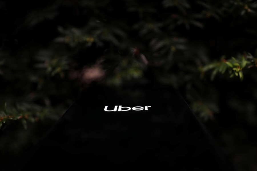 The Uber logo is displayed on a mobile phone in this picture illustration taken on November 25, 2019 — Reuters photo