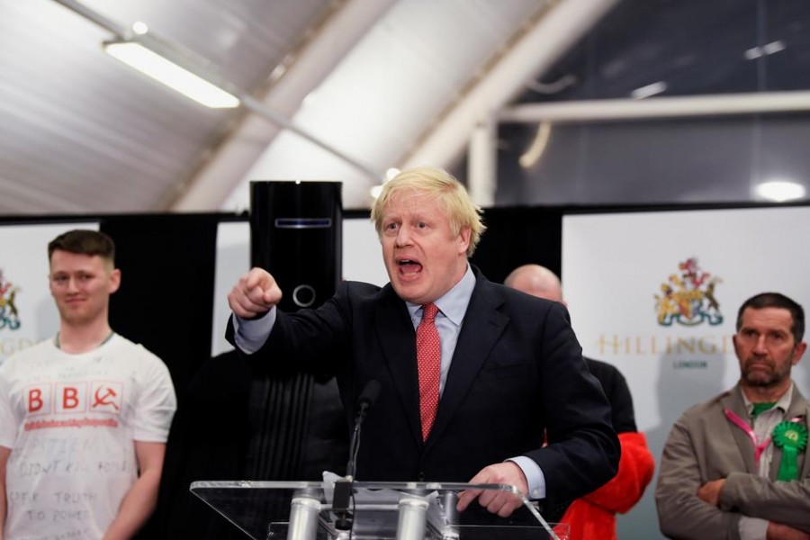 Conservatives' British Prime Minister Boris Johnson gestures while speaking after winning his seat at the counting centre in Britain's general election in Uxbridge, Britain, December 13, 2019. Reuters/Toby Melville TPX images of the day