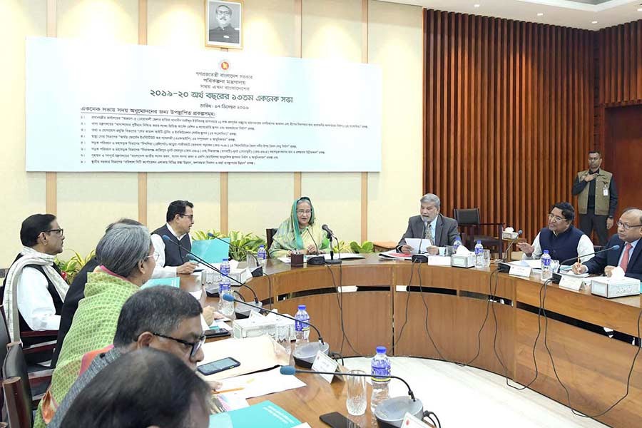 Prime Minister Sheikh Hasina presiding over the ECNEC meeting at NEC Conference room in the city on Tuesday. -PID Photo