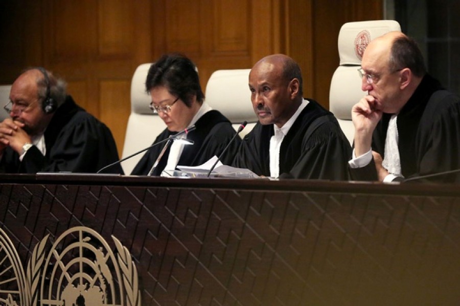 Judge Abdulqawi Ahmed Yusuf is pictured during the ruling in a case filed by Gambia against Myanmar alleging genocide against the minority Muslim Rohingya population, at the International Court of Justice (ICJ) in The Hague, Netherlands Jan 23, 2020. REUTERS