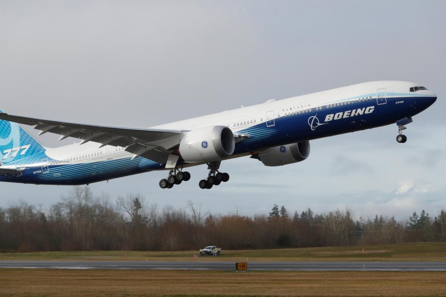 A Boeing 777X airplane takes off during its first test flight from the company's plant in Everett, Washington, U.S. January 25, 2020. REUTERS/Terray Sylvester