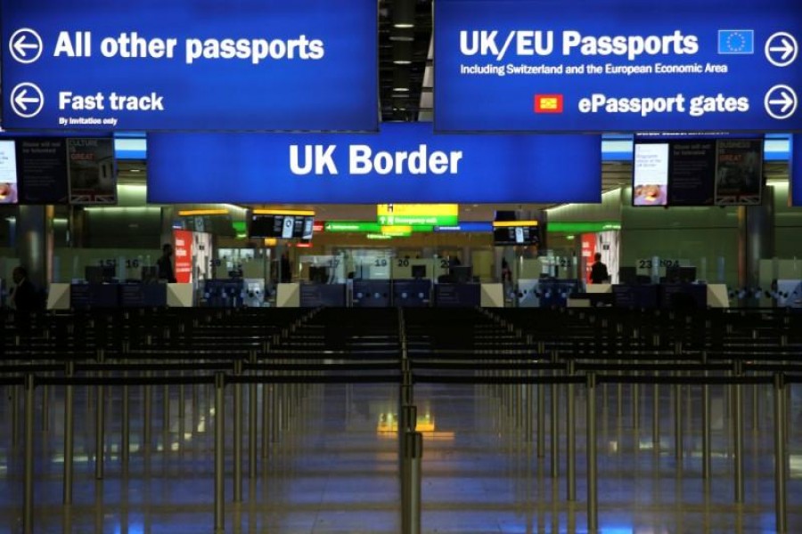 UK Border control is seen in Terminal 2 at Heathrow Airport in London June 4, 2014. Reuters/Files