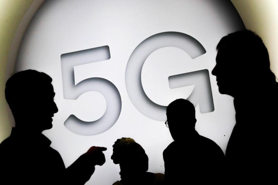 FILE PHOTO: A 5G sign is seen at the Mobile World Congress in Barcelona, Spain February 28, 2018. REUTERS/Yves Herman