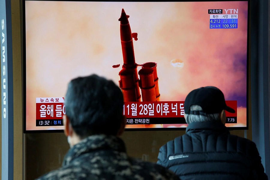 People watching a news on North Korea's missile firing on a television in Seoul of South Korea on Monday. -Reuters Photo