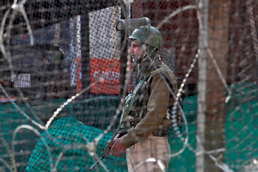 An Indian policeman stands guard outside a bunker alongside a road in Srinagar on October 31, 2019 — Reuters/Files