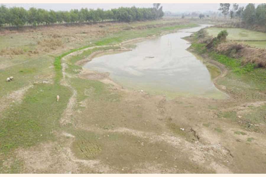 A poor state of the Nagore river in Bogura district	— FE Photo