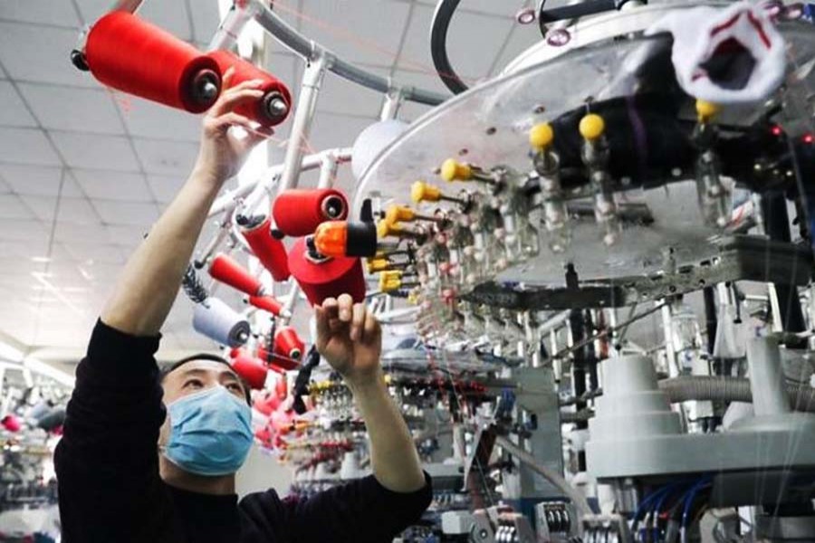 Japan factory output growth slows in Feb