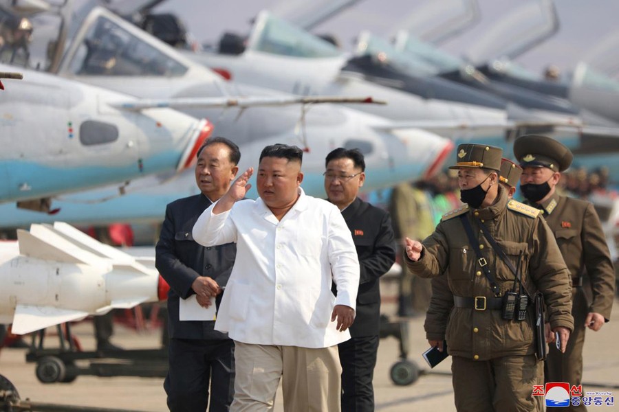 North Korean leader Kim Jong Un visits a pursuit assault plane group under the Air and Anti-Aircraft Division in the western area in this undated image released by North Korea's Korean Central News Agency (KCNA) in Pyongyang on April 12, 2020 — KCNA/via REUTERS