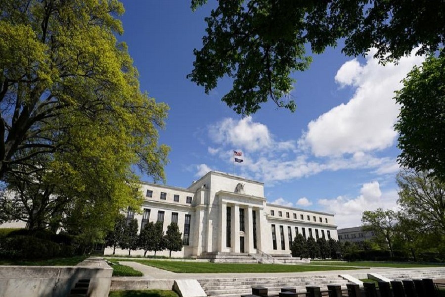 The Federal Reserve building is set against a blue sky, amid the coronavirus disease (COVID-19) outbreak, in Washington, US, May 01, 2020. — Reuters