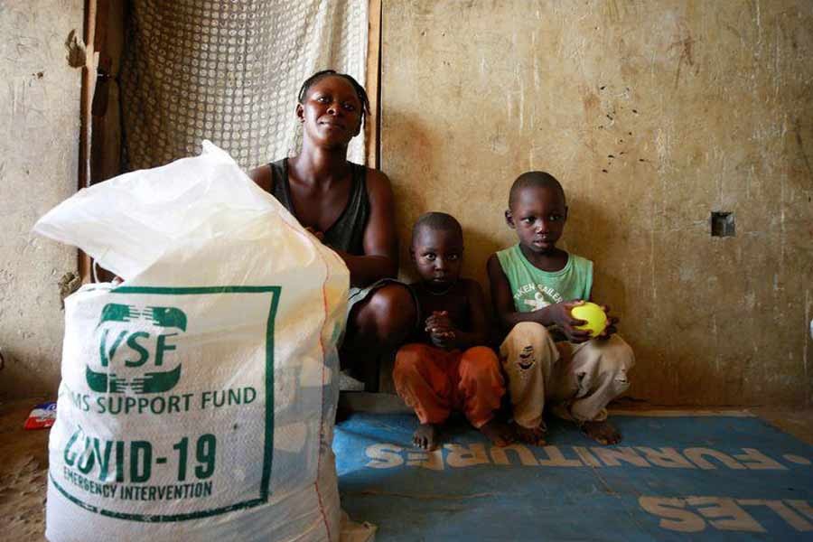 Internally displaced families receiving food items from Nigeria's Victims Support Fund, as the authorities struggle to contain the coronavirus disease (COVID-19) outbreak, in Abuja, Nigeria last month –Reuters File Photo