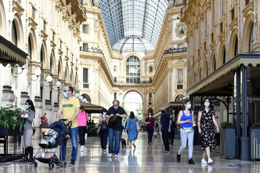 People walk at Galleria Vittorio Emanuele II, as Italy eases some of the lockdown measures put in place during the coronavirus disease (COVID-19) outbreak, in Milan, Italy, May 18, 2020. — Reuters
