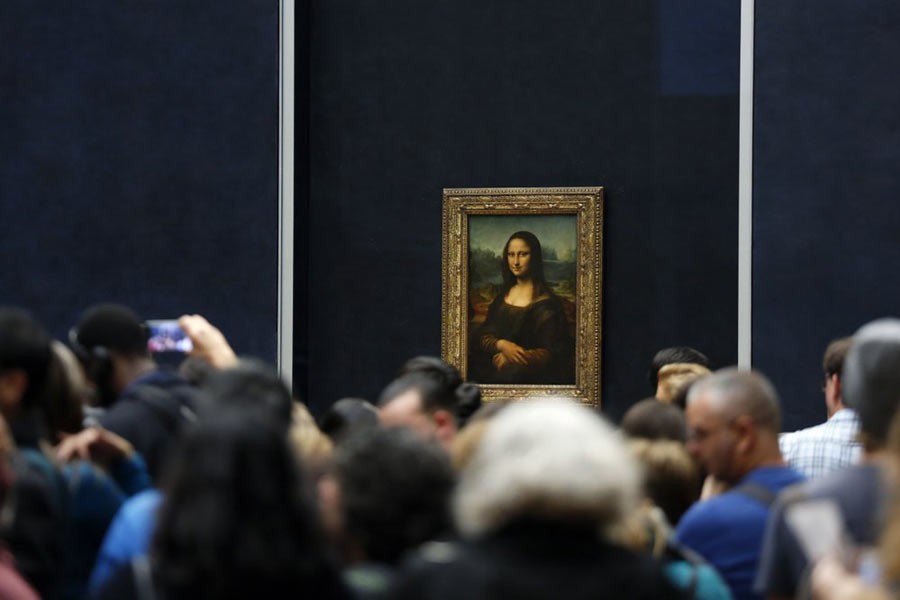 AP file photo shows, tourists waiting to see Leonardo da Vinci's painting Mona Lisa, at the Louvre museum, in Paris. –AP file photo
