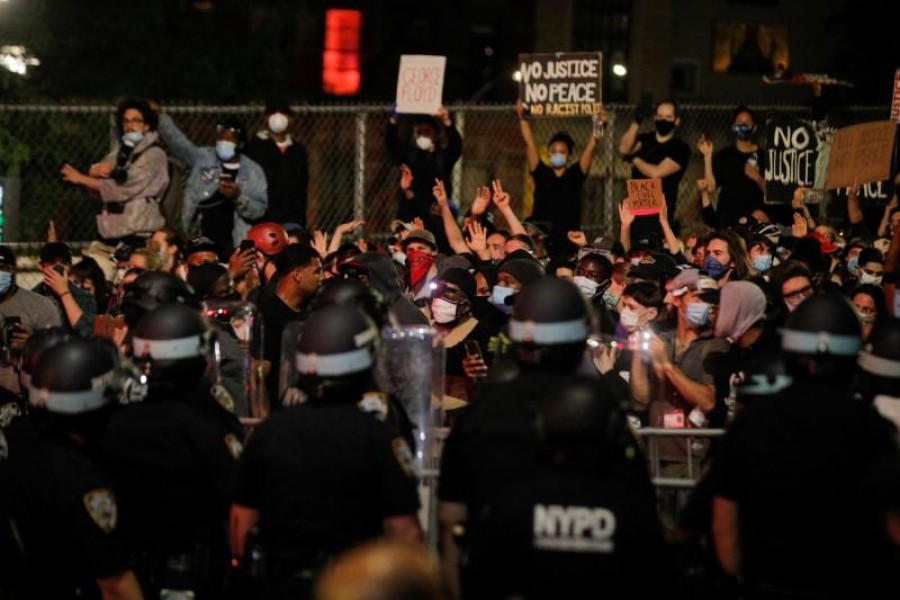 NYPD officers face demonstrators after curfew during a protest against the death in Minneapolis police custody of George Floyd, in New York City, US on June 2, 2020 — Reuters photo