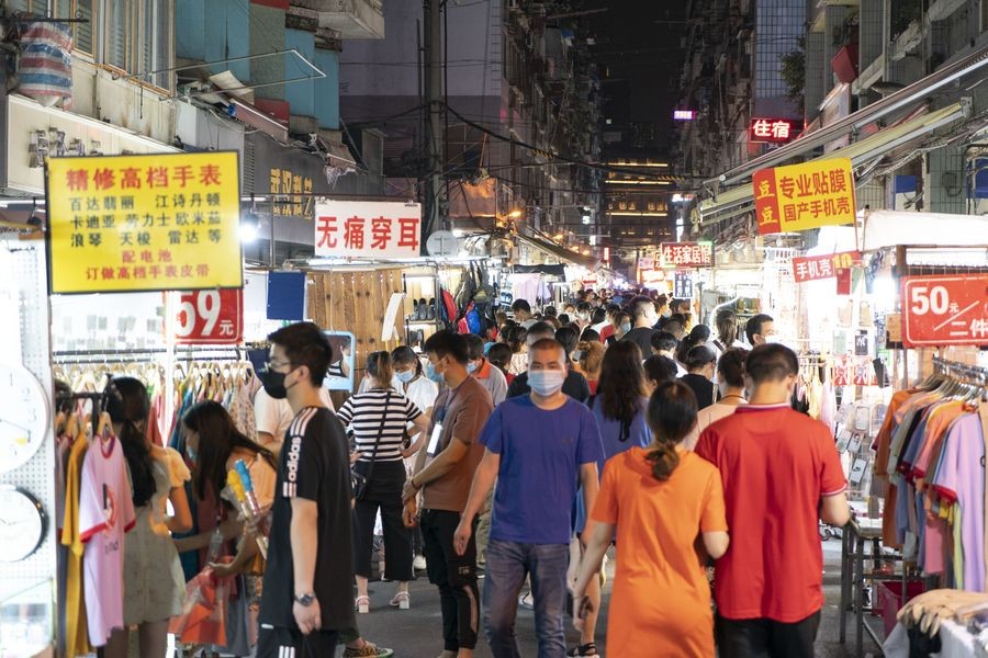People visit a night market at Baocheng Road in Wuhan, central China's Hubei Province, June 1, 2020. Wuhan, once hit hard by COVID-19, has seen its urban life gradually back to normal. (Xinhua/Xiong Qi)