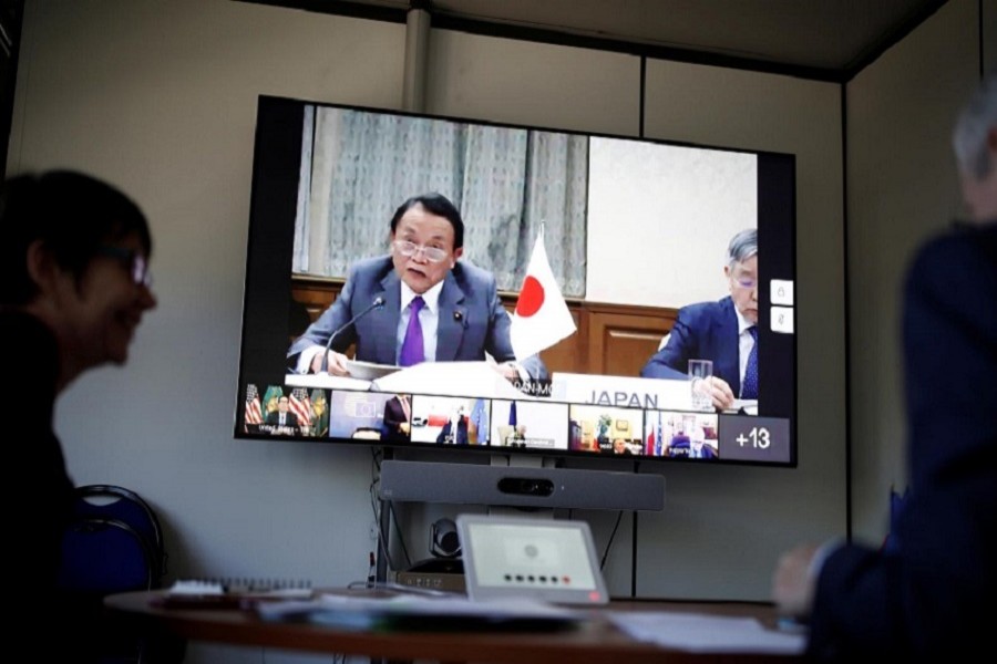 French Economy and Finance Minister Bruno Le Maire and Japan's Finance Minister Taro Aso attend G7 Finance Ministers meeting by videoconference at the Bercy Finance Ministry in Paris, France, April 14, 2020. — Reuters/Files
