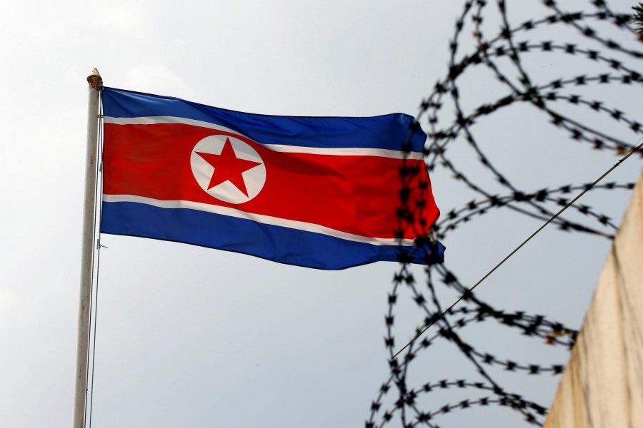 The North Korea flag flutters next to concertina wire at the North Korean embassy in Kuala Lumpur, Malaysia March 9, 2017. REUTERS/Edgar Su
