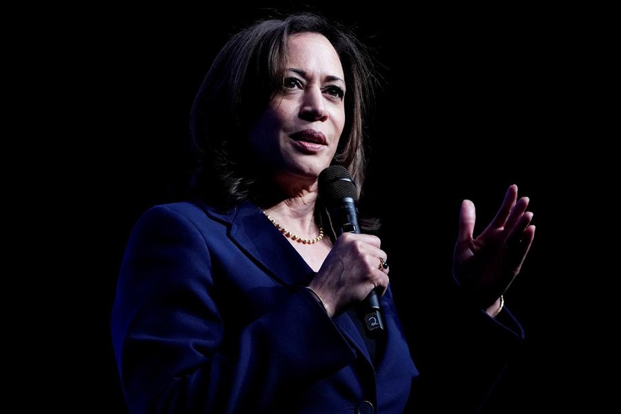 FILE PHOTO: Senator Kamala Harris, Joe Biden’s selection as his running mate, appears on stage at a First in the West Event at the Bellagio Hotel in Las Vegas, Nevada, U.S., November 17, 2019. REUTERS/Carlo Allegri