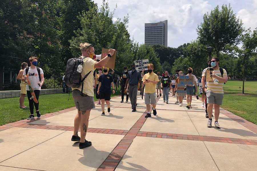 Protesters march opposing in-person classes at Georgia Tech in Atlanta, USA  — AP Photo