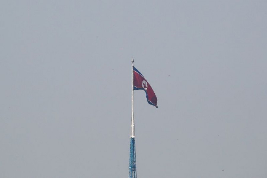 A North Korean flag flutters on top of the 160-metre tall tower at North Korea's propaganda village of Gijungdong, in this picture taken from Tae Sung freedom village near the Military Demarcation Line (MDL), inside the demilitarised zone separating the two Koreas, in Paju, South Korea on September 30, 2019 — Reuters/Files