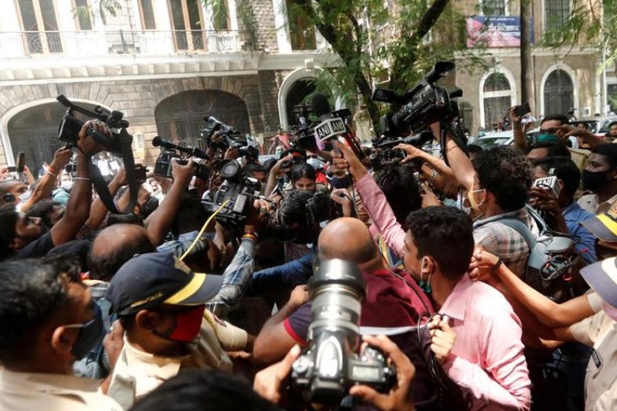 Media personnel surrounding Bollywood actor Rhea Chakraborty as she arrives at Narcotics Control Bureau (NCB) office for questioning, following the death of her boyfriend and actor Sushant Singh Rajput, in Mumbai on September 6 this year –Reuters file photo