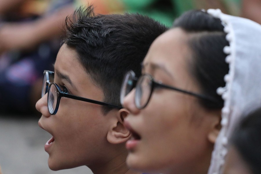 Young people are chanting slogans at a protest meeting in Dhaka	—FE Photo