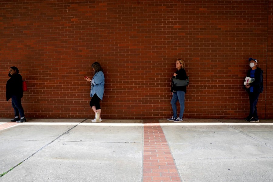 People who lost their jobs wait in line to file for unemployment benefits, following an outbreak of the coronavirus disease (COVID-19), at Arkansas Workforce Center in Fort Smith, Arkansas, US on April 6, 2020 — Reuters/Files