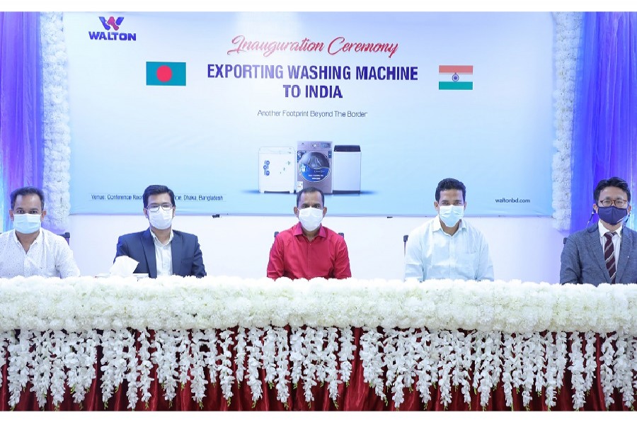 Top officials of Walton attend the inauguration ceremony of washing machine export to India held at the company’s corporate office in Dhaka city on Wednesday last.