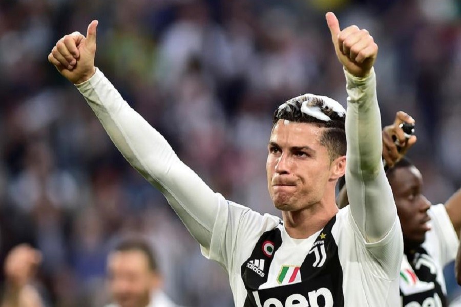Football - Serie A - Juventus v Fiorentina - Allianz Stadium, Turin, Italy - April 20, 2019 Juventus' Cristiano Ronaldo celebrates winning the league after the match — Reuters/Files