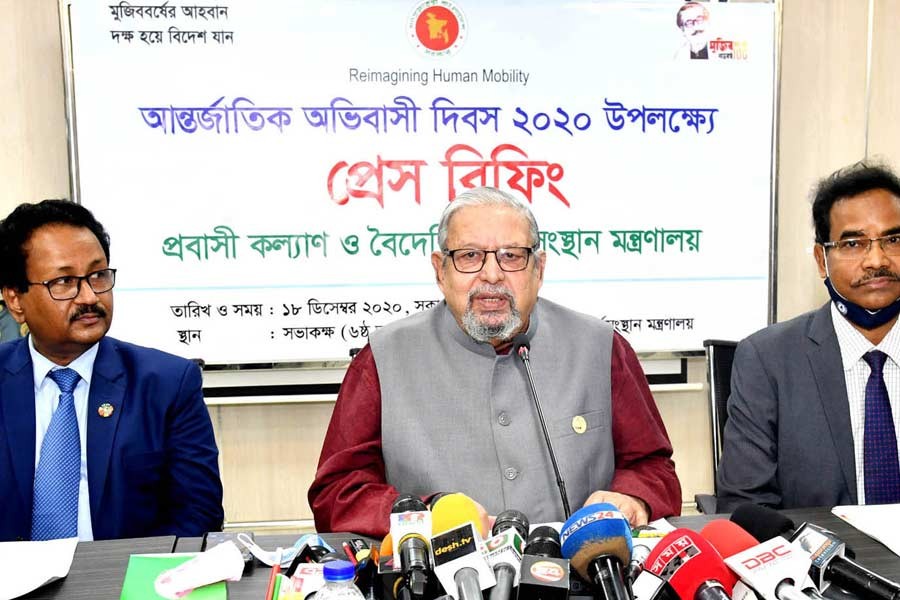 Expatriates’ Welfare and Overseas Employment Minister Imran Ahmad addressing a press conference on Friday on the occasion of ‘International Migration Day-2020 at the city’s Probashi Kallyan Bhaban. –PID Photo
