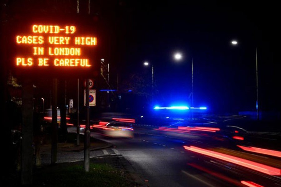 A government public health information message is seen on a roadside sign, amidst the spread of the coronavirus disease (Covid-19) pandemic, in London, Britain on January 4, 2021 — Reuters photo