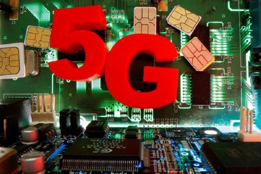 SIM cards and 3d printed objects representing 5G are put on a motherboard in this picture illustration taken April 24, 2020 — Reuters/Illustration