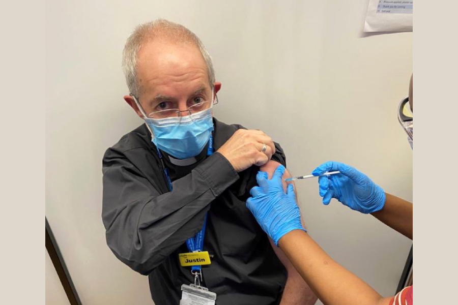 Archbishop of Canterbury Justin Welby receives a Covid-19 vaccine shot in London, Britain January 16, 2021 in this image obtained on social media. TWITTER/@JustinWelby via REUTERS