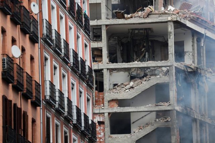 At least two dead, several injured after blast brings down building in central Madrid