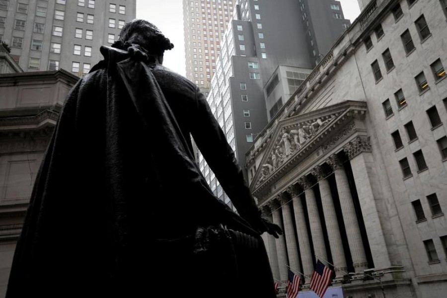 A statue of George Washington stands as Federal Hall across Wall Street from the New York Stock Exchange in Manhattan in New York City, New York, US on October 26, 2020 — Reuters/Files