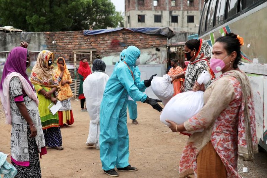 Volunteers from an organisation distribute relief supplies among transgenders, amid the coronavirus disease (Covid-19), in Dhaka, Bangladesh, April 23, 2020 — Reuters/Files
