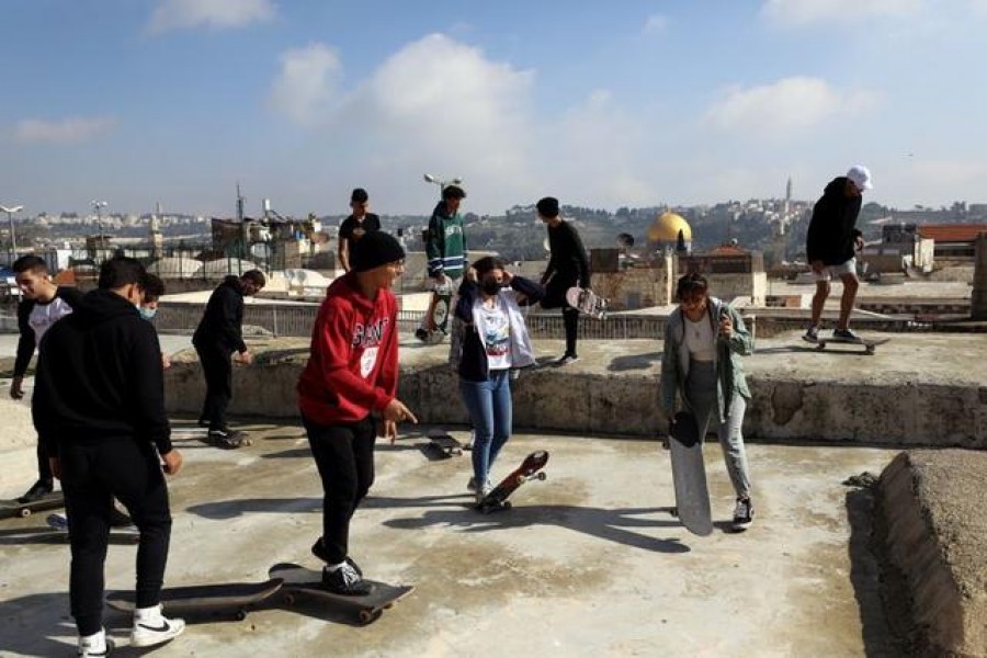High above Jerusalem's crowds, skating the Old City rooftops