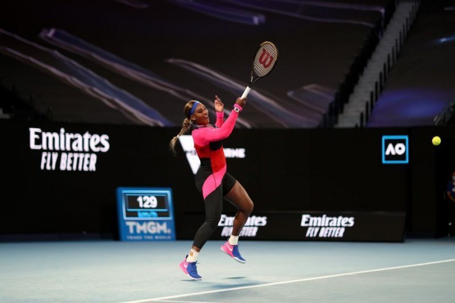 Serena comes through Halep test to reach semi-finals