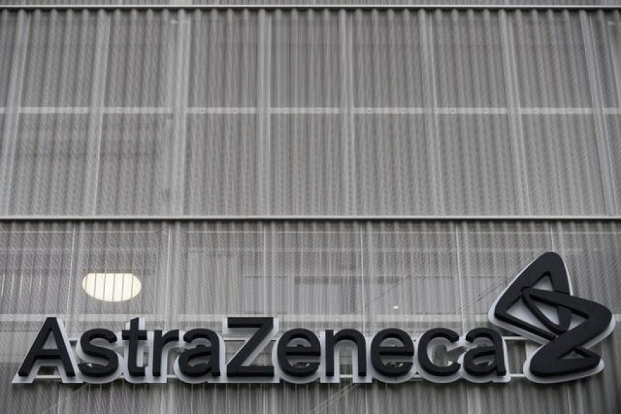 FILE PHOTO: The AstraZeneca logo is pictured outside the AstraZeneca office building in Brussels as part of the coronavirus disease (COVID-19) vaccination campaign, Belgium, January 28, 2021. REUTERS/Johanna Geron