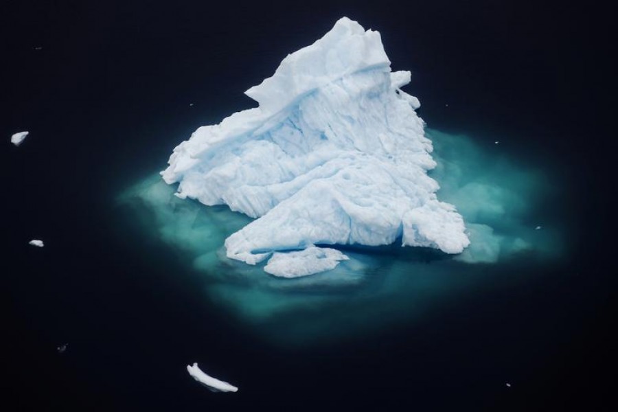FILE PHOTO: An iceberg floats in a fjord near the town of Tasiilaq, Greenland, June 24, 2018. REUTERS/Lucas Jackson