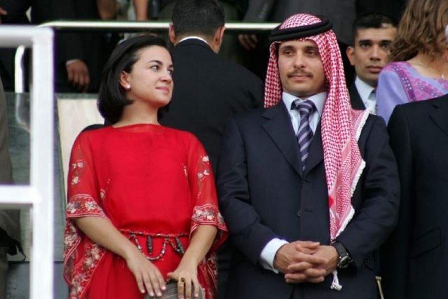 Jordan's Prince Hamza (R) and his wife Princess Noor attend official celebrations of the 10th anniversary of King Abdullah's accession to the throne, in Amman, June 9, 2009 — Reuters/Files