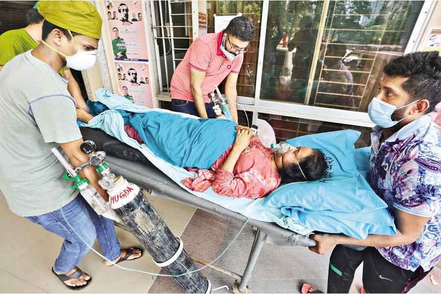 No ICU bed was available for Minara Begum, a critical Covid-19 patient, at Dhaka Medical College Hospital where she works as a nursing supervisor. Finally, she was shifted to Mugda General Hospital where an ICU bed was arranged for her — FE photo by KAZ Sumon