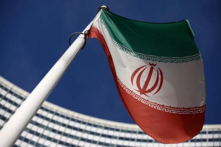 The Iranian flag waves in front of the International Atomic Energy Agency (IAEA) headquarters, before the beginning of a board of governors meeting, amid the coronavirus disease (COVID-19) outbreak in Vienna, Austria, March 1, 2021. REUTERS/Lisi Niesner/File Photo